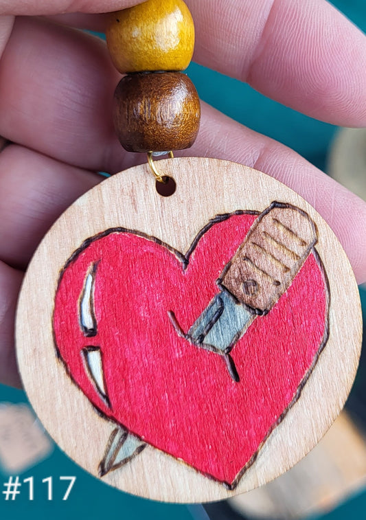 Tattoo art heart-wood ornament.